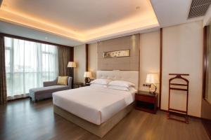 Postelja oz. postelje v sobi nastanitve Wyndham Garden Foshan Nanhai