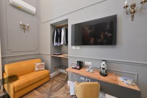 TV a/nebo společenská místnost v ubytování Toledo 424 Suite