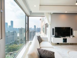 TV/Unterhaltungsangebot in der Unterkunft iHome-Lujiazui Riverside, Shanghai's Leading Advocate for Genuine Apart ment - Committed to Quality, Bund RiverView&CityWalk, Deluxe Neighborhood