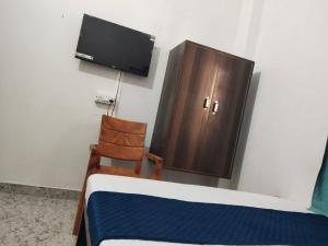 TV a/nebo společenská místnost v ubytování Shree K.B Guest House