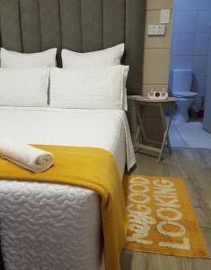 Ένα ή περισσότερα κρεβάτια σε δωμάτιο στο Elgin Guest Unit +10 φωτογραφίες
