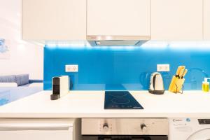 A cozinha ou kitchenette de Amazing Modern Central Apt in Athens