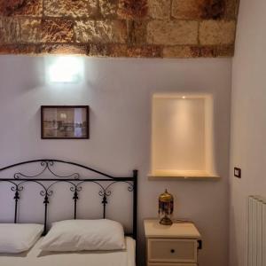 Postel nebo postele na pokoji v ubytování Corte San Vincenzo