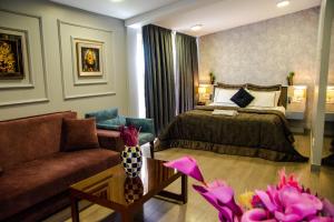 A bed or beds in a room at Star of İstanbul Residence