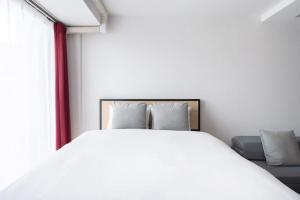 Postel nebo postele na pokoji v ubytování Axia