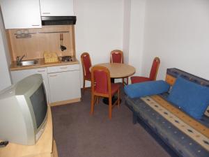 Kuchyň nebo kuchyňský kout v ubytování Apartments Monika