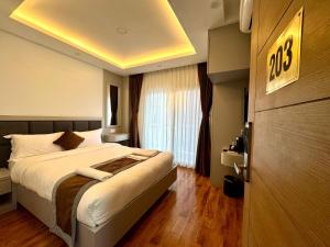 Letto o letti in una camera di Hotel Alleyway Express