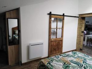Postel nebo postele na pokoji v ubytování L'Oustal