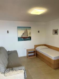 Postel nebo postele na pokoji v ubytování Apartments Lucija