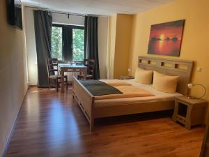 Postel nebo postele na pokoji v ubytování Hotel Rabenstein