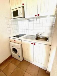 Η κουζίνα ή μικρή κουζίνα στο Appartement vue mer, terrasse, place de parking privée, proximité des commerces