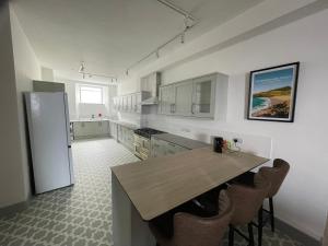 Kuchyň nebo kuchyňský kout v ubytování Abergwaun Cottage