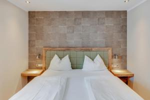 Łóżko lub łóżka w pokoju w obiekcie Design Apartment Villa Anna Kitzbühel