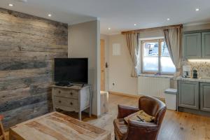 Telewizja i/lub zestaw kina domowego w obiekcie Design Apartment Villa Anna Kitzbühel