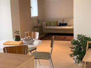Postel nebo postele na pokoji v ubytování Casa Cedro - Il Brolo Holiday Homes
