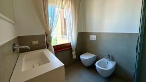 Koupelna v ubytování Bilocale in piazza a Numana - CASA DEL SOLE SX + 9 fotografií