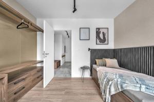 Postel nebo postele na pokoji v ubytování Apartment VIVA TEBA Vrchlabí