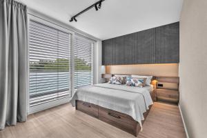 Postel nebo postele na pokoji v ubytování Apartment VIVA TEBA Vrchlabí