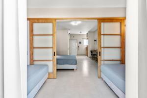 Voodi või voodid majutusasutuse Aqualand Resort toas