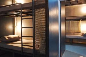 Ένα ή περισσότερα κρεβάτια σε δωμάτιο στο Urban Bed