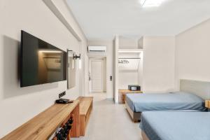 Voodi või voodid majutusasutuse Aqualand Resort toas