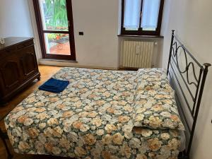 Postel nebo postele na pokoji v ubytování Al Portico Private Rooms