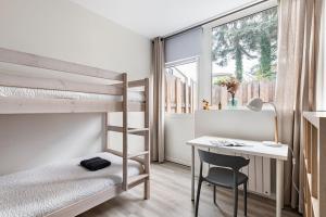 Posteľ alebo postele v izbe v ubytovaní ECUREUIL - Charme et Standing à Saint Galmier