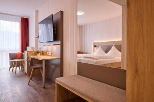 Postel nebo postele na pokoji v ubytování Hotel Zum Schiff