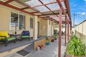 Un balcon sau o terasă la Anzac Cottage