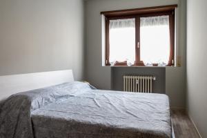Posteľ alebo postele v izbe v ubytovaní Cardinal massaia venice apartment