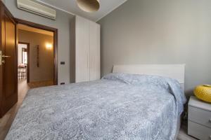 Posteľ alebo postele v izbe v ubytovaní Cardinal massaia venice apartment