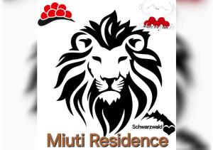a stencil of a lion with the words mud resistance at Miuti Residence in Triberg +72 photos