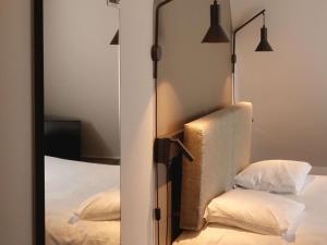 Postel nebo postele na pokoji v ubytování ibis Lille Centre Grand Place