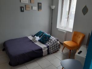 Postel nebo postele na pokoji v ubytování cocon d'Eden