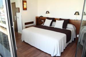 Postel nebo postele na pokoji v ubytování Hotel Don Paco