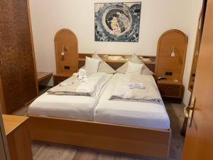 Postel nebo postele na pokoji v ubytování Hotel Friesengeist