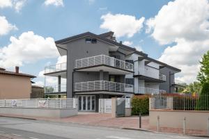 a house on the side of a street at Apartment Il Giglio in Montelupo Fiorentino