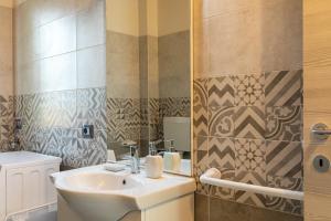 a bathroom with a sink and a shower at Chalet La Greta Vista Superiore in Firenzuola +37 photos