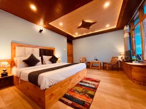 Postel nebo postele na pokoji v ubytování The Sana Luxury Stay, Manali