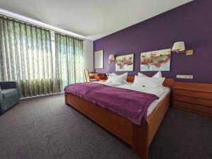 Postel nebo postele na pokoji v ubytování Parkhotel Hitzacker + 33 fotografií