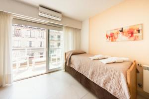 Le Batiment Apartments客房内的一张或多张床位