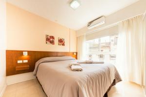 Le Batiment Apartments客房内的一张或多张床位