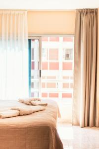 Le Batiment Apartments客房内的一张或多张床位