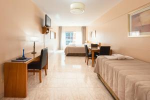 Le Batiment Apartments客房内的一张或多张床位