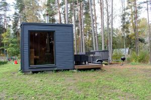 Zahrada ubytování Minimaja saunaga vaatega männimetsale