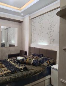 Кровать или кровати в номере Home stay bunga