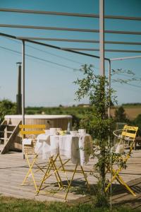 a table and chairs sitting on a patio at Casa Kiko Pecetto in Pecetto