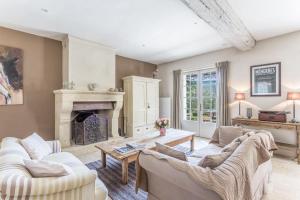 Posezení v ubytování Au Cœur de la Pinède