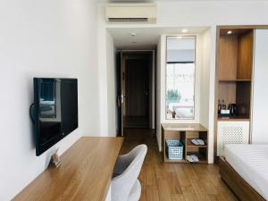 Kuchyň nebo kuchyňský kout v ubytování Royal Dragon Boutique Hotel Tan Binh