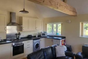 Η κουζίνα ή μικρή κουζίνα στο 5 Abbey View cottages, Battle, East Sussex +2 φωτογραφίες